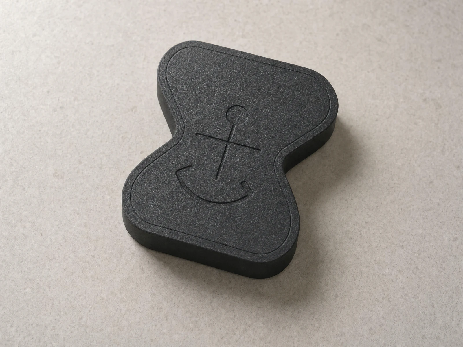 The matte-charcoal Anchor V5.9 physical device